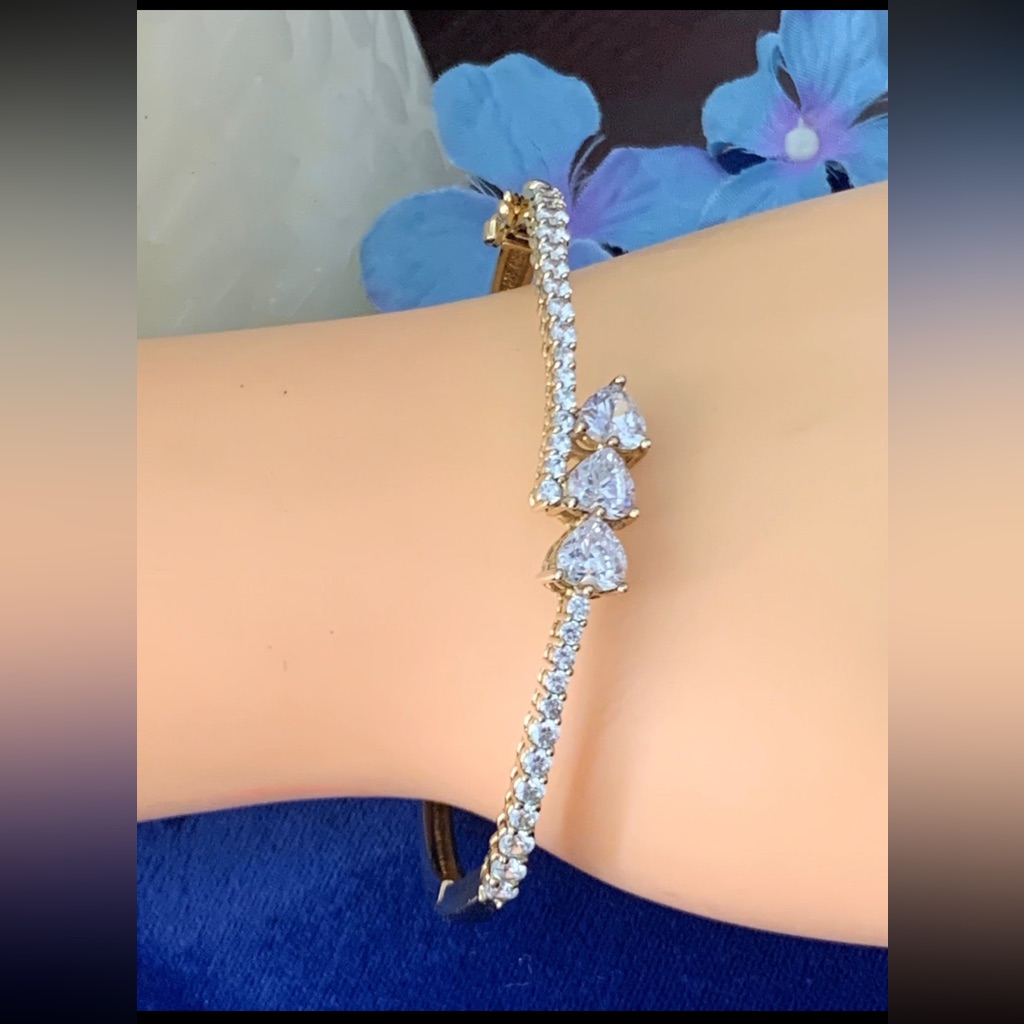 Gold Over 925 Sterling Silver Tennis Bracelet With Shiny Heart Zircon..